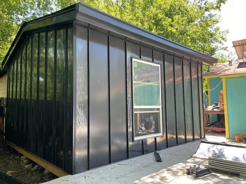 Black standing seam metal wall panels for Metal Roof Installation in Horsham